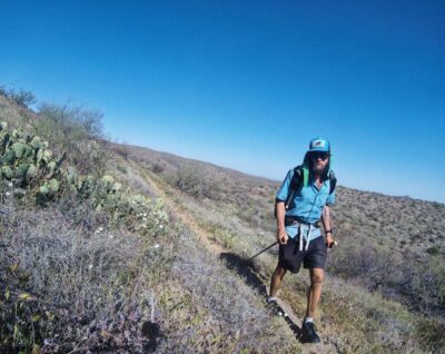 Legend walking along the trail