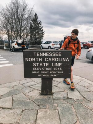 PYT looking at the Tennessee North Carolina State line sign