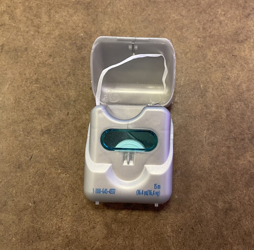 a floss container