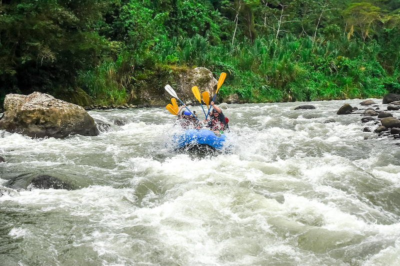 A raft going down some rapids on the Pacuare River