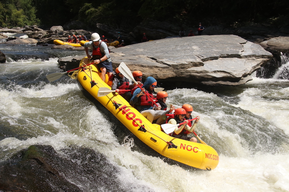Chatooga-River_Whitewater_Rafters A group of whitewater rafters in a yellow raft on the Chattooga River