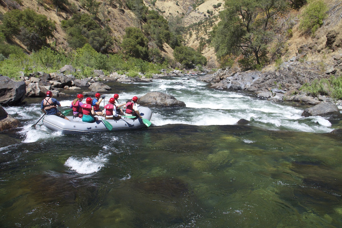 whitewater rafters going down a rapid on the Tuolumne River