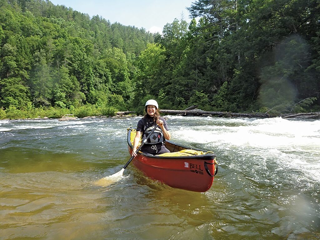 a woman in a canoe on a river in Georgia
