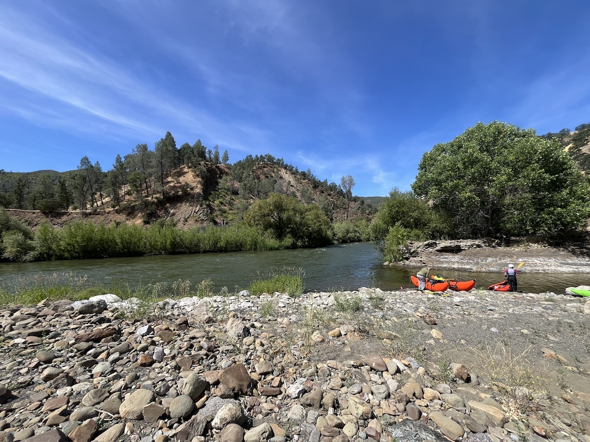 kayakers along the bank of cache creek