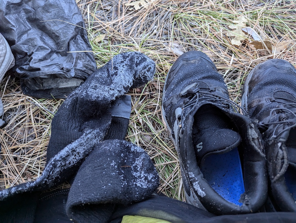 frozen socks and shoes on trail
