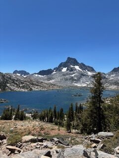 a lake at the base of a mountain