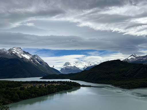 a curving river with mountains on both sides on the Torres del Paine