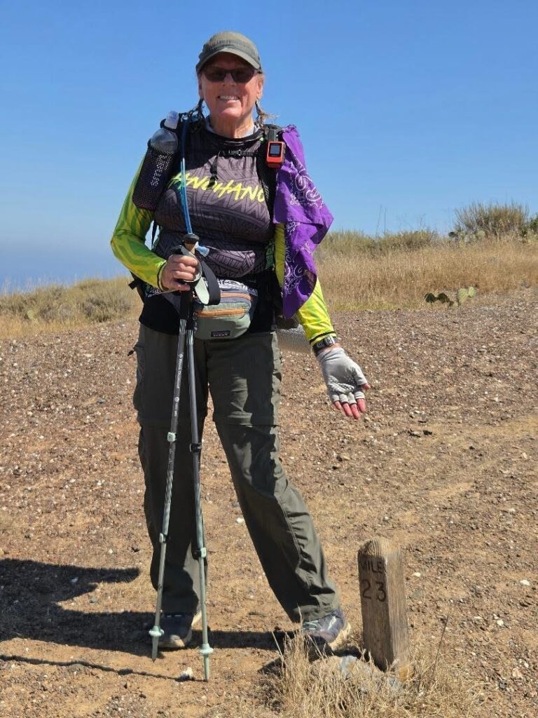 a hiker smiling on the Trans Catalina Trail